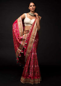 Rani Pink Saree In Silk With Ikkat Weaved Patola Pattern And Embroidery Work Online - Kalki Fashion