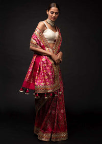 Rani Pink Saree In Silk With Ikkat Weaved Patola Pattern And Embroidery Work Online - Kalki Fashion