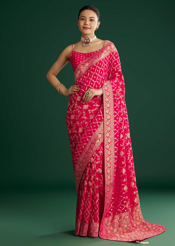 Rani Pink Woven Saree With Jaal Work And Floral Border