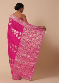Rani Pink Banarasi Silk Saree With Floral Motif Pallu And Unstitched Blouse Piece