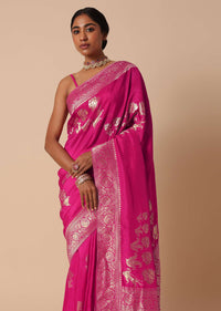 Rani Pink Banarasi Silk Saree With Floral Motif Pallu And Unstitched Blouse Piece