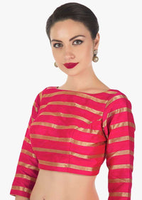 Rani pink blouse in silk with copper color weave in stripes motif only on Kalki