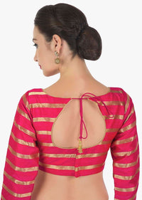Rani pink blouse in silk with copper color weave in stripes motif only on Kalki