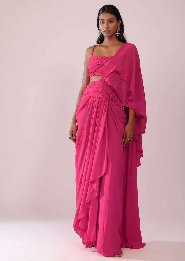 Rani Pink Crepe Drape Saree And Blouse With Crystal Detailing On the Strap
