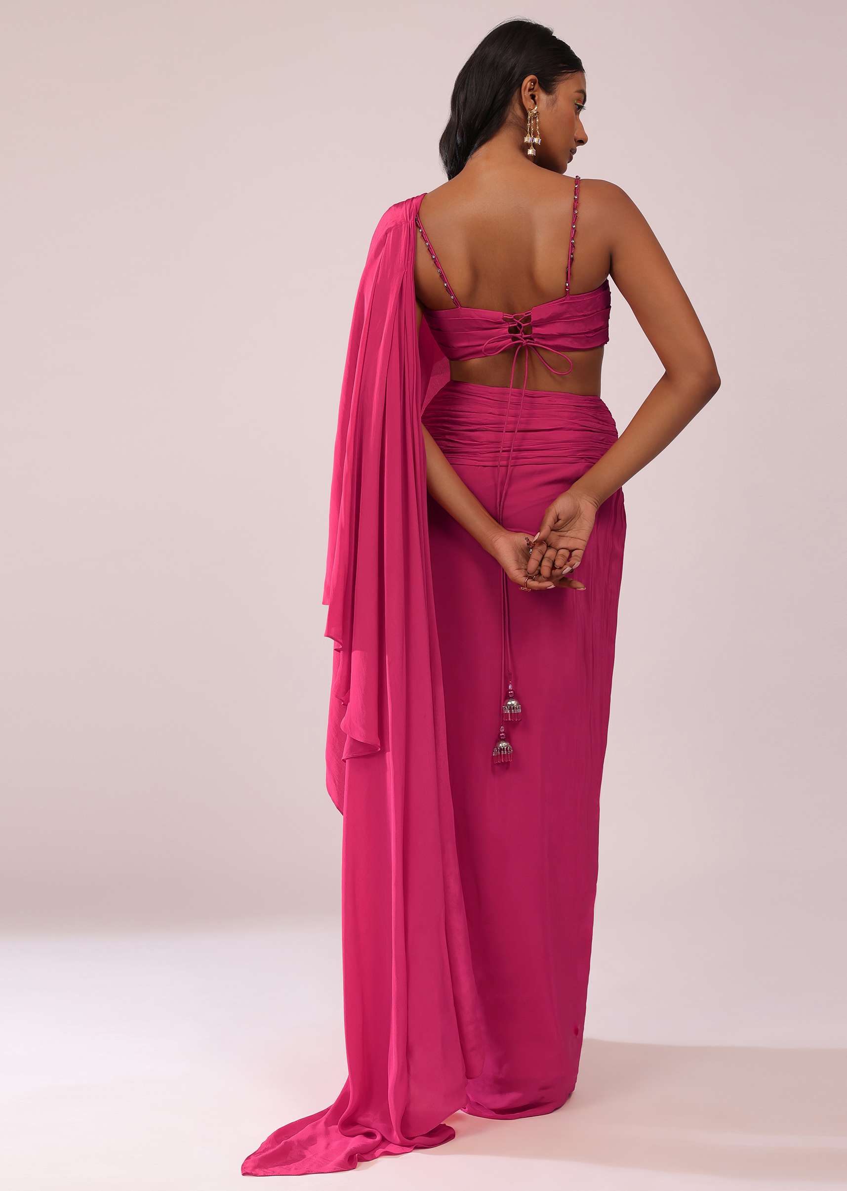 Rani Pink Crepe Drape Saree And Blouse With Crystal Detailing On the Strap