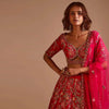 Rani Pink Lehenga Choli In Raw Silk With Hand Embroidered Cluster Of Flowers Cascading Into Floral Buttis