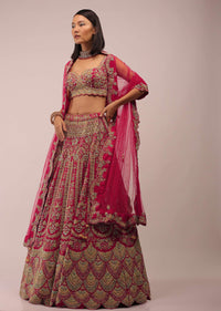 Rani Pink Lehenga In Mughal Inspired Architecture Embroidery In Kalidar Motifs,Crafted In Raw Silk With Multi Color Beads,And Zardozi In Scallops