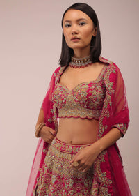 Rani Pink Lehenga In Mughal Inspired Architecture Embroidery In Kalidar Motifs,Crafted In Raw Silk With Multi Color Beads,And Zardozi In Scallops