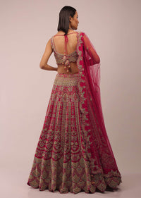 Rani Pink Lehenga In Mughal Inspired Architecture Embroidery In Kalidar Motifs,Crafted In Raw Silk With Multi Color Beads,And Zardozi In Scallops