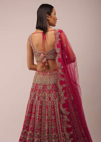 Rani Pink Lehenga In Mughal Inspired Architecture Embroidery In Kalidar Motifs,Crafted In Raw Silk With Multi Color Beads,And Zardozi In Scallops