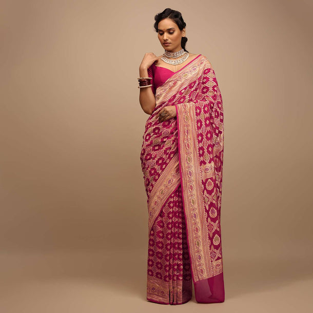 Rani Pink Saree In Georgette With Woven Geometric Jaal And Floral Border