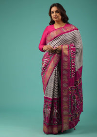 Rani Pink Soft Silk Patola Saree With White And Brown Stripes And Stick On Kundan Work