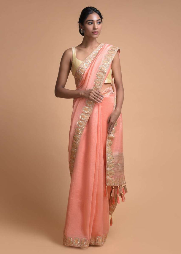 Ravishing Peach Saree In Linen Silk With Gotta Patch Embroidery In Floral Buttis And Leaf Pattern Online - Kalki Fashion