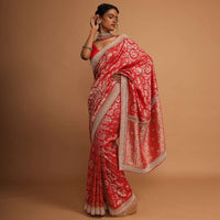 Red banarasi dola silk saree with jaal embroidery Online - Kalki Fashion