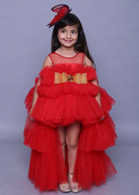 Red Gown In Net With High Low Ruffle Layers And Golden Bow On The Waist Online - Kalki Fashion