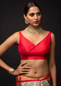 Red Sleeveless Blouse In Silk With Leaf Cut Neckline