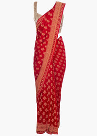 Red georgette saree in weaved floral butti and border only on Kalki