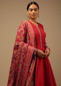 Red Anarkali Suit In Raw Silk With Hand Embroidery And A Brocade Dupatta Enhanced With Bandhani