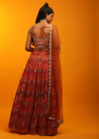 Red And Burnt Orange Lehenga In Georgette With Chevron And Bandhani Print And Mirror Embroidered Choli