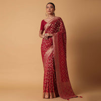 Red Banarasi Georgette Saree With Bandhani Weave And Unstitched Blouse Piece