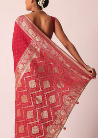 Red Bandhani Saree With Weave Detail And Unstitched Blouse Piece