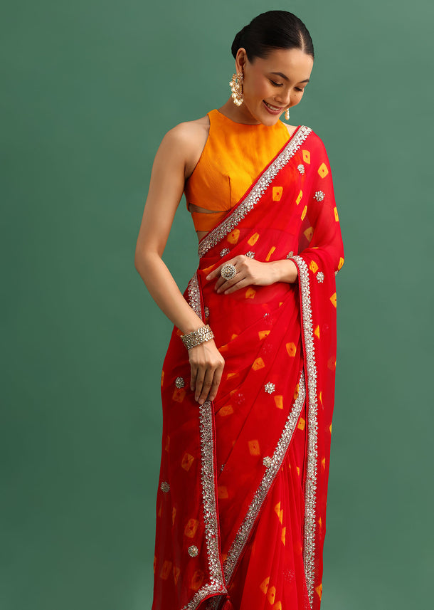 Red Chiffon Bandhani Saree With Cutdana Border And Unstitched Blouse