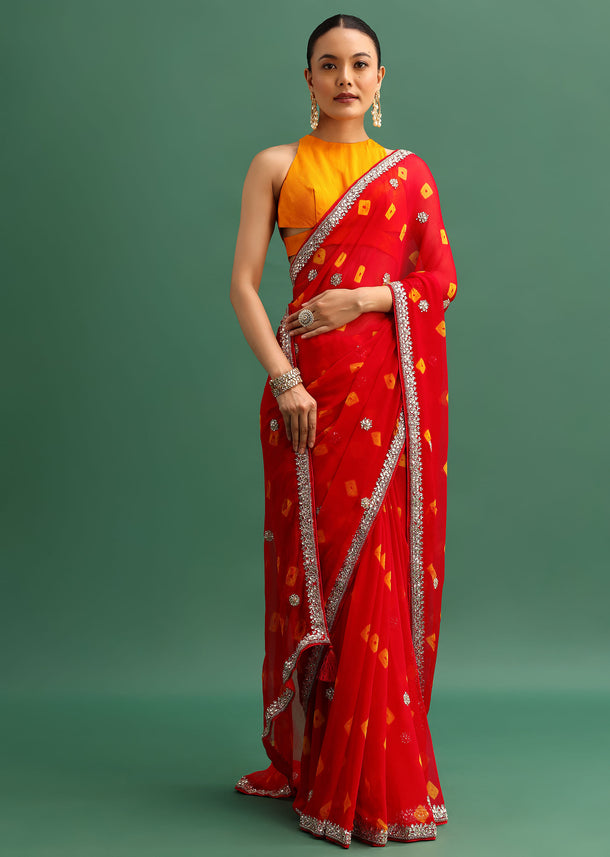 Red Chiffon Bandhani Saree With Cutdana Border And Unstitched Blouse