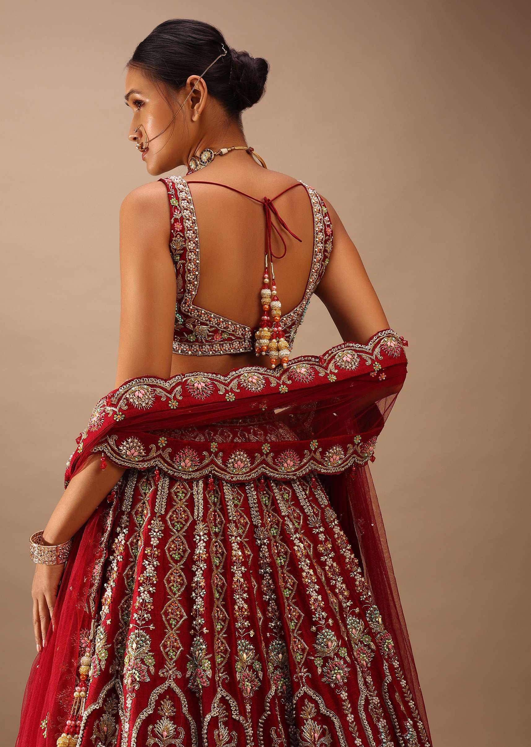 Red Lehenga And A Crop Top In Royal Heritage Embroidery, Bustier Comes In Sleeveless With Back Hooks Closure