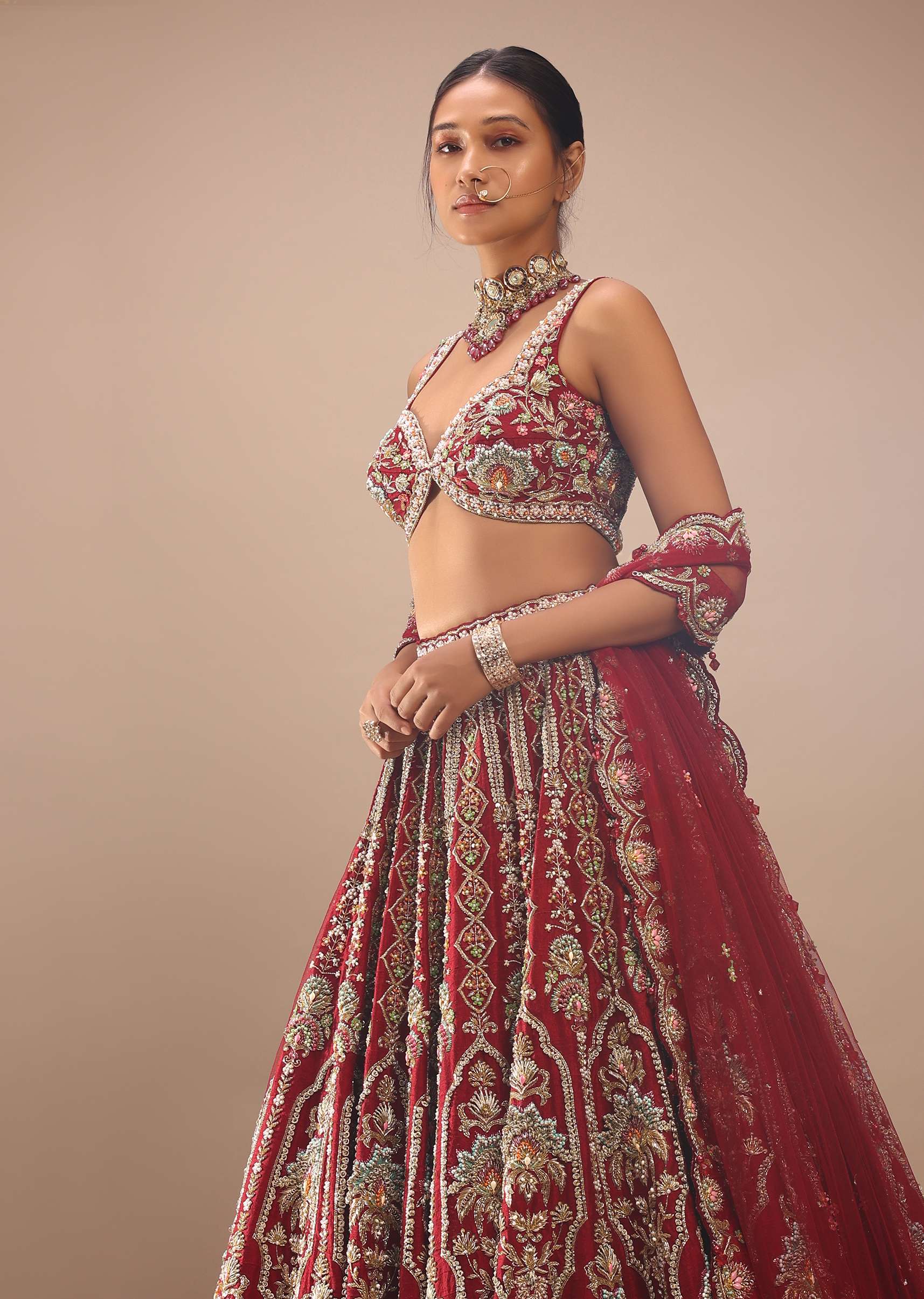 Red Lehenga And A Crop Top In Royal Heritage Embroidery, Bustier Comes In Sleeveless With Back Hooks Closure