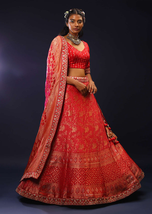 Red Lehenga Choli With Woven Bandhani And Brocade Jaal Along With A Shaded Bandhani Dupatta