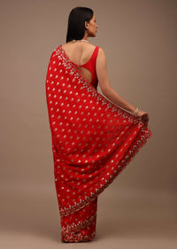 Red Saree In Silk With Brocade Woven Floral Buttis And Moti Embroidered Border Design