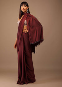 Blood Red Satin Saree With Fringes On The Pallu Paired With Hand Embroidered Bustier