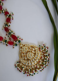 Red Stone Long Necklace With A Kundan Pendant And Pearls By Paisley Pop