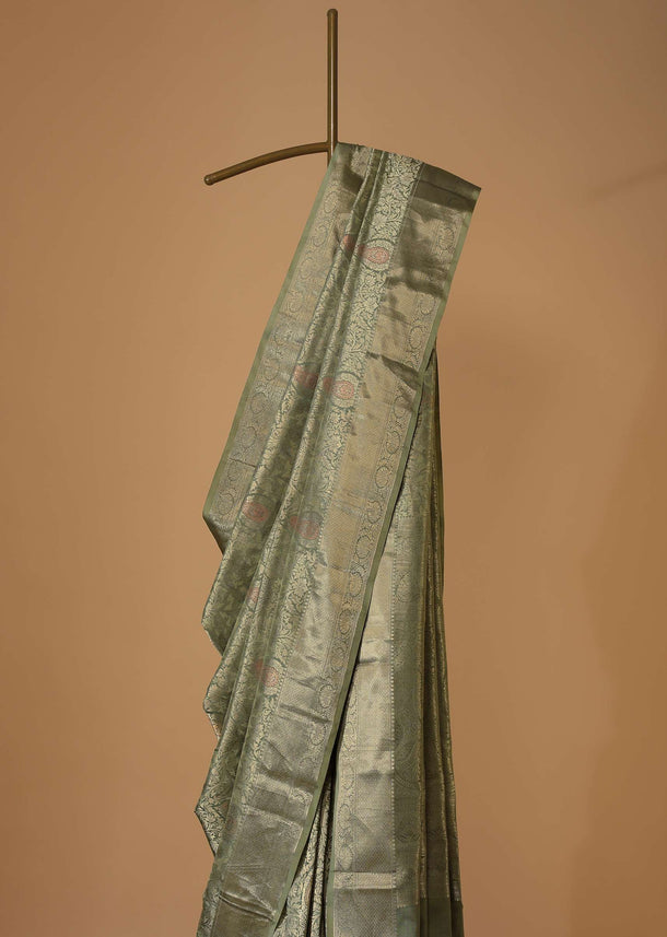 Moss Green Kanjivaram Saree In Pure Uppada Silk With Weave And An Unstitched Blouse