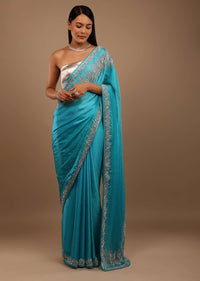 River Blue Satin Saree With Swarovski Stone Work In A Floral Pattern