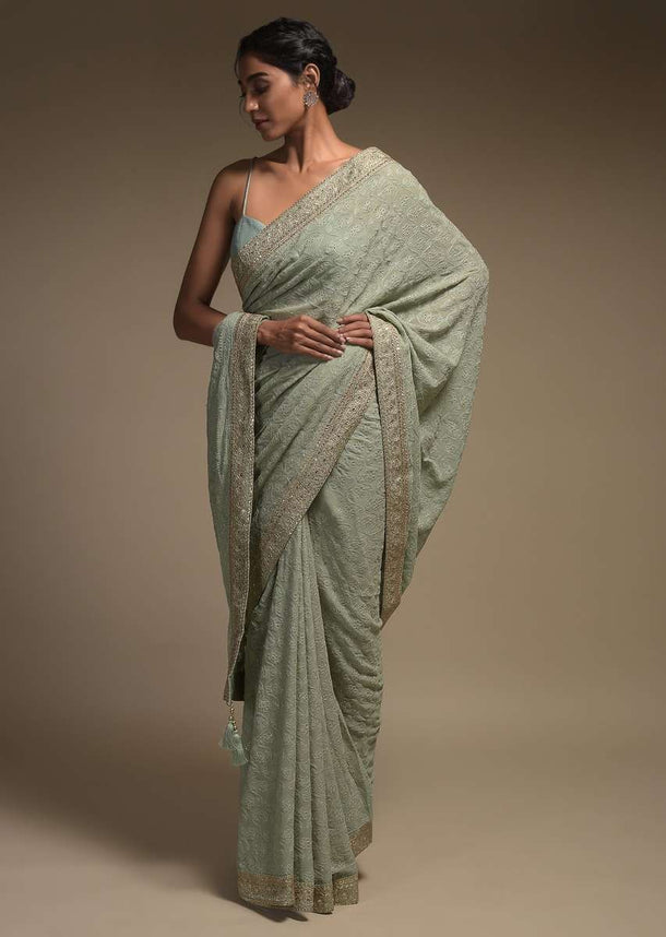 Romaine Green Saree In Georgette With Lucknowi Thread Work In Moroccan Mesh Pattern With Floral Buttis Online - Kalki Fashion