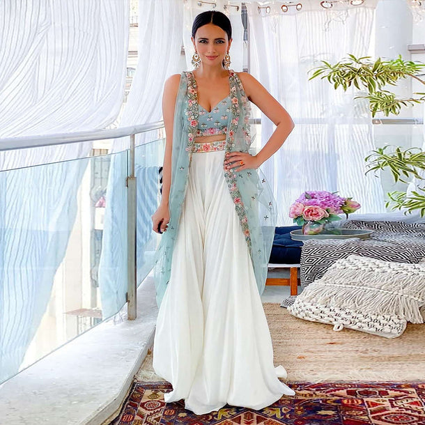 Roshni Chopra In Kalki White Palazzo Suit With A Sage Green Raw Silk Crop Top Adorned Using Vibrant Resham Embroidered Summer Blooms