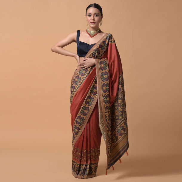 Rust Orange Saree In Silk With Printed Patola Design On The Border Online - Kalki Fashion