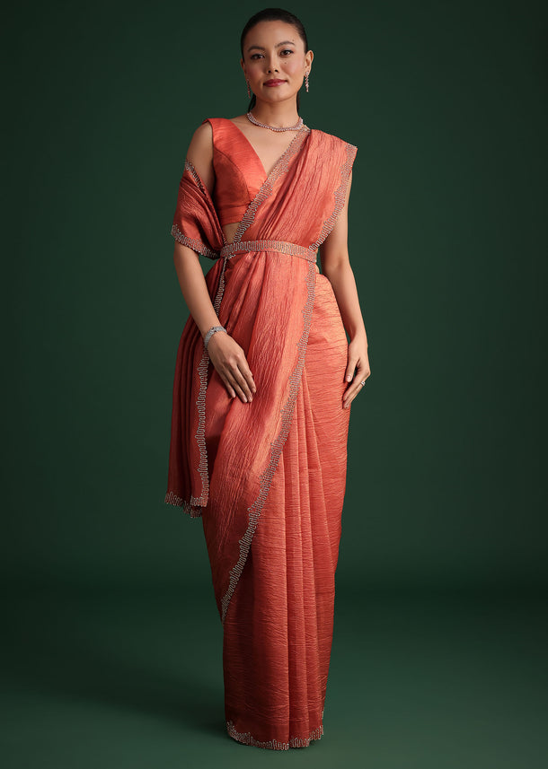 Rust Pink Crushed Tissue Saree With Diamond Work Border