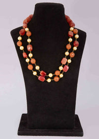 Rustic brown and orange beaded double layer necklace with alternate cream pearls only on Kalki