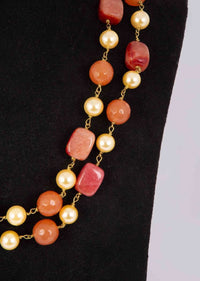 Rustic brown and orange beaded double layer necklace with alternate cream pearls only on Kalki
