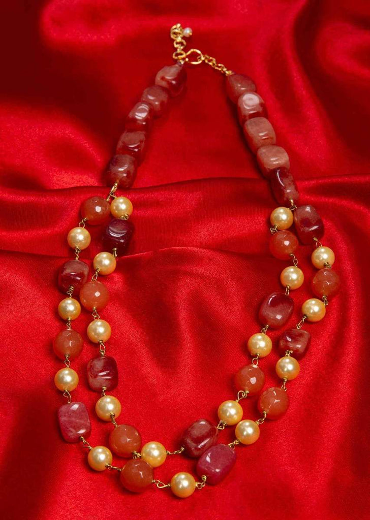 Rustic brown and orange beaded double layer necklace with alternate cream pearls only on Kalki