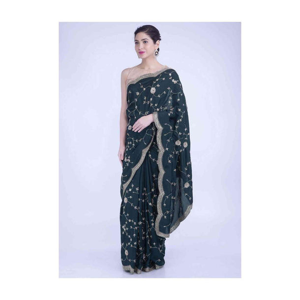 Sacramento green silk saree with matching blouse piece only on Kalki