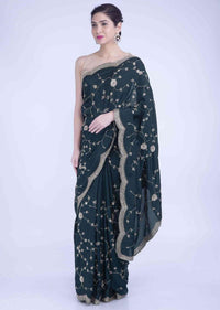 Sacramento green silk saree with matching blouse piece only on Kalki