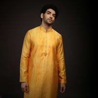 Saffron Yellow Kurta Set In Raw Silk With Tie Dye Design All Over And Resham Work On The Placket