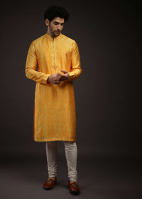 Saffron Yellow Kurta Set In Raw Silk With Tie Dye Design All Over And Resham Work On The Placket