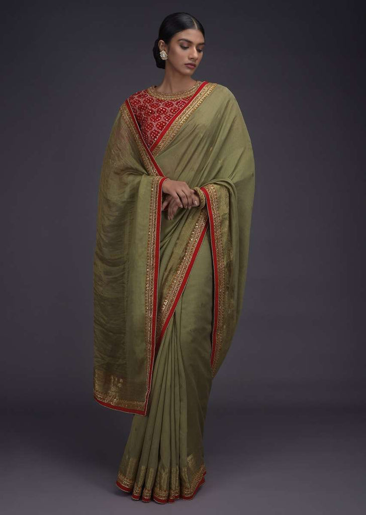 Sage Green Handloom Saree With Weaved Buttis And Border And Red Bandhani Printed Blouse Online - Kalki Fashion