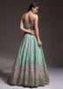 Sage Green Lehenga Choli In Raw Silk With Vibrant Resham Embroidered Cluster Of Summer Blooms And Buttis