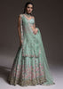 Sage Green Lehenga Choli In Raw Silk With Vibrant Resham Embroidered Cluster Of Summer Blooms And Buttis