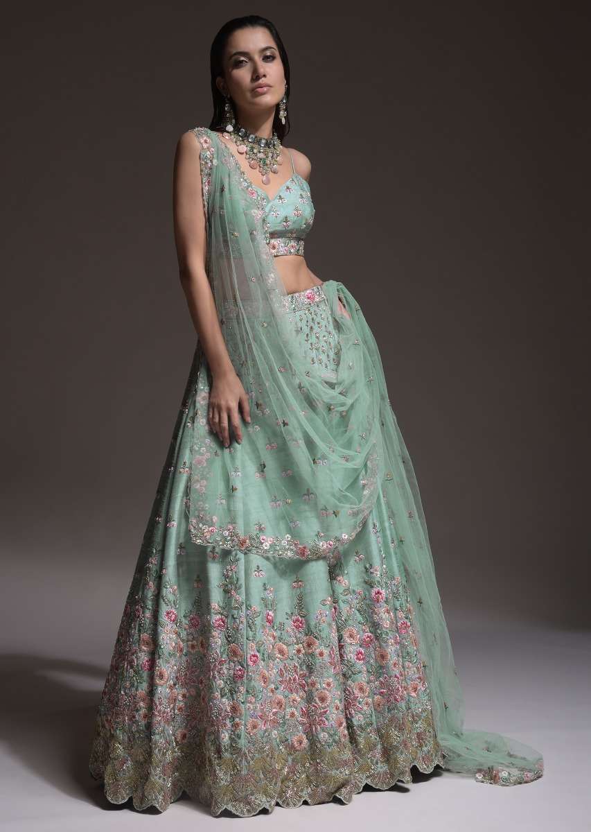 Sage Green Lehenga Choli In Raw Silk With Vibrant Resham Embroidered Cluster Of Summer Blooms And Buttis